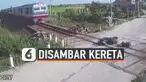JATUH DI PERLINTASAN, PEMOTOR NYARIS DISAMBAR KERETA API