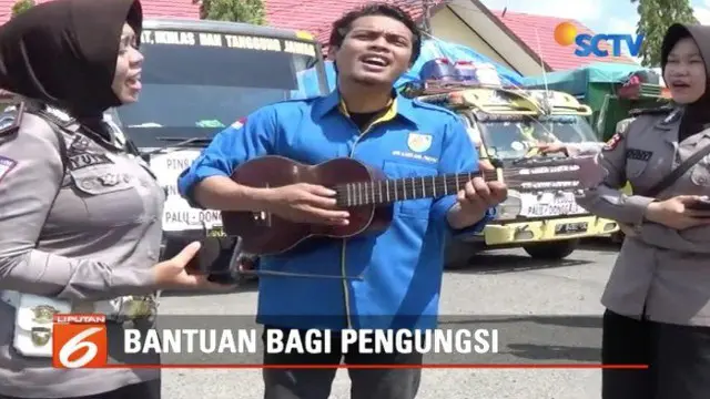 Polres Pinrang, Komisi Nasional Pemuda Indonesia, dan Pinrang Car Community kirim musisi untuk menghibur korban bencana di Sulawesi Tengah.
