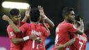 Para pemain Singapura merayakan kemenangan atas Timnas Indonesia pada laga Piala AFF di Stadion Nasional, Singapura, Jumat (9/11). Singapura menang 1-0 atas Indonesia. (Bola.com/M. Iqbal Ichsan)