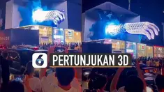 Terlihat visual tiga dimensi saat itu menunjukkan tangan kanan seperti keluar dari layar.