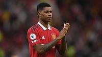 Sejauh ini, Marcus Rashford selalu menjadi pilihan utama Erik ten Hag sebagai juru gedor Manchester United. Ia bahkan mampu menyingkirkan nama besar Cristiano Ronaldo dengan selalu dipercaya turun sebagai starter di enam laga terakhir. Jebolan akademi MU tersebut sejauh ini telah mengemas 3 gol dan 2 assist dari 6 laga. Rashford juga mendapatkan rating 7,16 oleh Whoscored. (AFP/Oli Scarff)