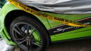 Lamborghini dengan nomor polisi B 1285 SHP itu tampak dipasangi garis polisi, Jakarta, (1/9/14). (Liputan6.com/Faizal Fanani)