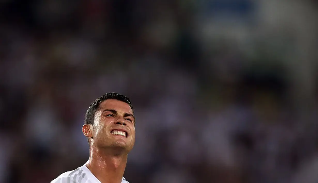 Ekspresi kekecewaan Cristiano Ronaldo. (AFP Photo/Johannes Eisele)