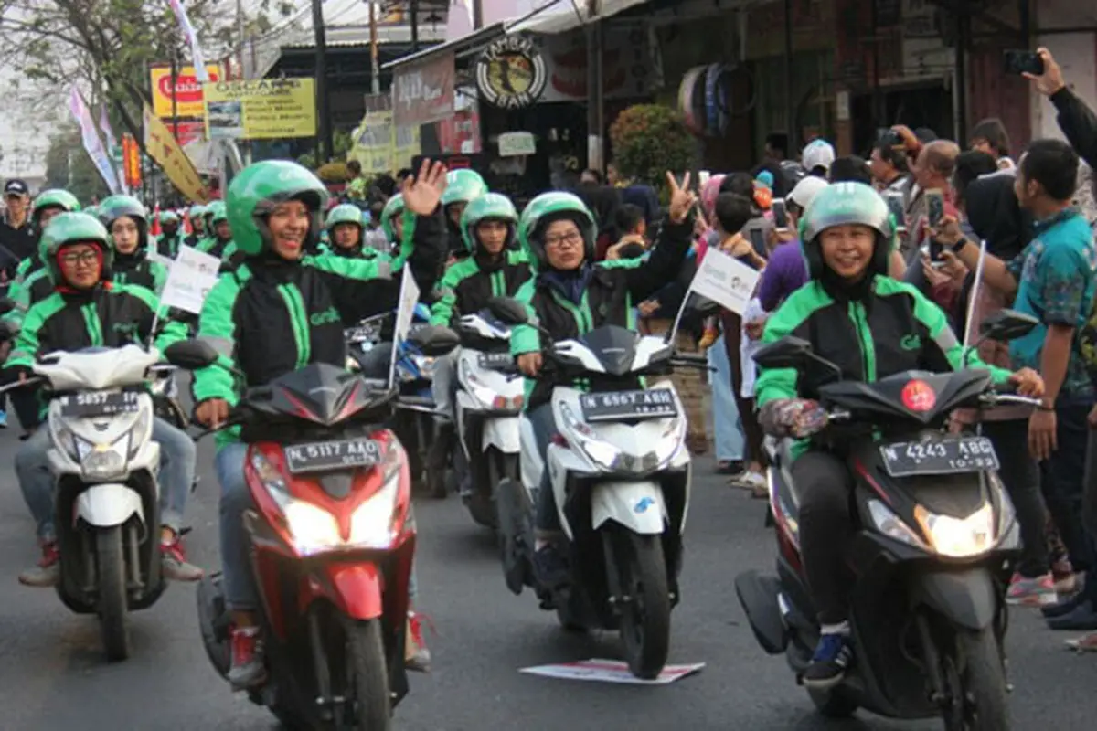 Driver Grab Bike Mengaku Bangga Jadi Bagian Kirab Obor Asian Games 2018