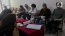 Pemilih juga harus membawa dokumen pendukung untuk pindah memilih. (Liputan6.com/Herman Zakharia)