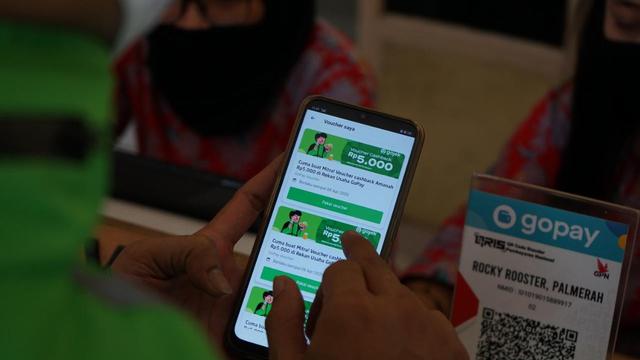 embagian voucher ini adalah realisasi salah satu dari 12 program bantuan untuk mitra driver Gojek di masa COVID-19. Dok Gojek