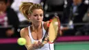 Sepanjang kariernya, Camila Giorgi, sudah meraih satu gelar juara WTA dan lima gelar juara ITF. (AFP/Anne-Christine Poujoulat)