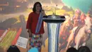 Ibu negara, Iriana Joko Widodo memberikan sambutan di acara amal ke 47 WIC di JCC, Jakarta, Rabu (19/11/2014). (Liputan6.com/Herman Zakharia)
