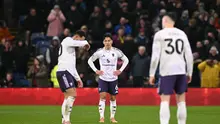 Lisandro Martinez (tengah) pada pertandingan MU kontra Burnley di ajang Liga Inggris. (Oli SCARFF / AFP)