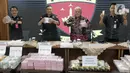 Sebelumnya Kejaksaan Agung resmi menetapkan tiga hakim pada Pengadilan Negeri (PN) Surabaya yakni Erintuah Damanik, Heru Hanindyo, dan Mangapul sebagai tersangka penerima suap dalam kasus vonis bebas pembunuhan Gregorius Ronald Tannur. (Liputan6.com/Herman Zakharia)