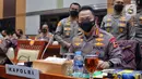 Kepala Kepolisian Negara Republik Indonesia (Kapolri) Jenderal Pol. Listyo Sigit Prabowo saat mengikuti rapat dengar pendapat (RDP) dengan DPR RI di Jakarta, Rabu (24/8/2022). Rapat tersebut membahas kasus penembakan Brigadir J di rumah dinas Irjen Pol. Ferdy Sambo. (Liputan6.com/Angga Yuniar)