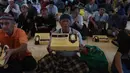 Sepanjang bulan suci Ramadan 1447 Hijriah, Masjid Istiqlal, Jakarta, kembali menggelar program buka puasa gratis bagi para jemaah. Tampak dalam foto, umat muslim sesaat sebelum menikmati waktu berbuka puasa pada hari pertama Ramadan 1447 Hijriah di Masjid Istiqlal, Jakarta, Selasa (19/2/2026). (Kapanlagi.com/Budy Santoso)