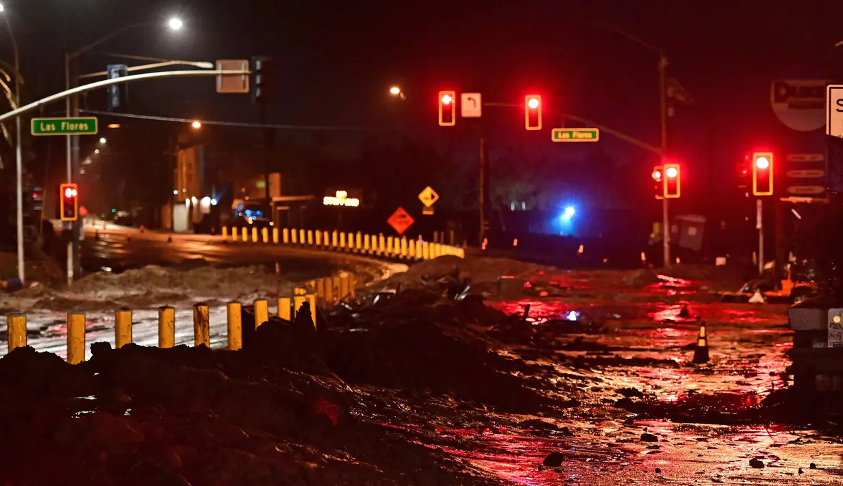 Hujan deras mengguyur sebagian besar wilayah California Selatan, termasuk Los Angeles County, Kamis (13/2/2025) sore waktu setempat. (AGUSTIN PAULLIER/AFP)