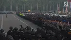 Personel gabungan TNI, Polri, dan pemerintahan mengikuti apel gelar pasukan dalam rangka menyambut Lebaran Idul Fitri 2018 di Lapangan Monas, Jakarta Pusat, Rabu (6/6). Operasi kepolisian ini bersandi 'Operasi Ketupat 2018'. (Merdeka.com/Imam Buhori)