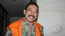 Bupati Tapanuli Tengah non aktif Raja Bonaran Situmeang usai menjalani sidang lanjutan di Pengadilan Tipikor, Jakarta, Senin (16/3/2015). Majelis hakim menolak nota keberatan (eksepsi) Bonaran atas dakwaan Jaksa KPK. (Liputan6.com/Helmi Afandi)