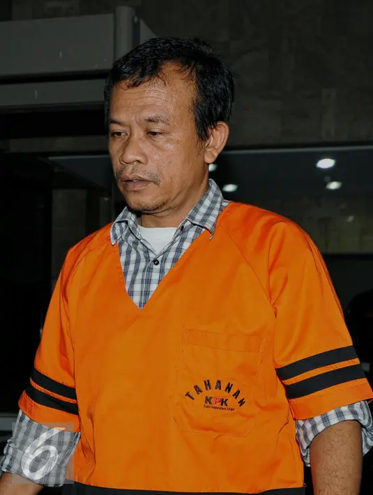 Hakim Anggota PTUN Medan Dermawan Ginting  usai menjalani pemeriksaan di gedung KPK, Jakarta, Selasa (29/07).  Diperiksa KPK terkait kasus dugaan suap gugatan sengketa korupsi dana bantuan sosial (bansos) di Sumatera Utara. (Liputan6.com/Yoppy Renato)