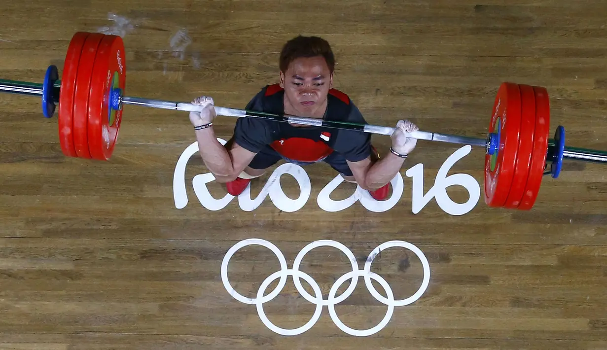 Pada Olimpiade Rio 2016, Eko Yuli Irawan yang berlomba di kelas 62 kg memperbaiki prestasinya dengan meraih medali perak dengan angkatan total 312 kg. (AFP/Pool/Stoyan Nenov)