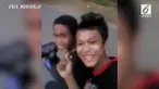 Sebuah rekaman menunjukkan perilaku dua ABG yang malah bernyanyi dengan handphone sambil mengendarai motor.