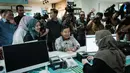 Program ini menyasar seluruh usia, mulai bayi berumur 2 bulan hingga lanjut usia. (YASUYOSHI CHIBA/AFP)