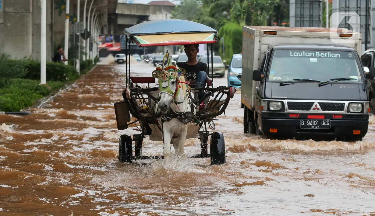 Sebelumnya, hujan deras yang mengguyur Jakarta sejak Selasa (28/1) hingga Rabu (29/1/2025) menyebabkan genangan air di sejumlah wilayah. (Liputan6.com/Herman Zakharia)