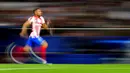 Pemain Atletico Madrid Renan Lodi berlari saat melawan Manchester City pada pertandingan sepak bola leg kedua perempat final Liga Champions di Stadion Wanda Metropolitano, Madrid, Spanyol, 13 April 2022. Pertandingan berakhir imbang 0-0. (AP Photo/Manu Fernandez)