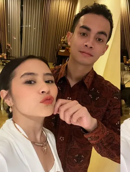 Wajahnya dipulas dengan makeup blush on pink, serta lipstik matte coral. Riasan mata dibuat soft dengan eyeshadow putih shimmer. Rambutnya ditata sanggul modern dengan bagian depan rapi.  [@prillylatuconsina96]