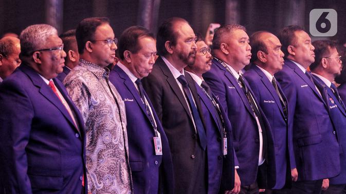 Ketum Partai NasDem Surya Paloh (tengah) bersama Gubernur DKI Jakarta Anies Baswedan (kedua kiri) menghadiri pembukaan Kongres II Partai NasDem di JIExpo, Jakarta, Jumat (8/11/2019). Kongres II Partai NasDem mengusung tema Restorasi Untuk Indonesia Maju. (Liputan6.com/Johan Tallo)