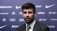 7. Gerard Pique - Bek Barcelona tersebut mulai aktif di dunia politik usai mengkampanyekan pemisahan Catalunya dari negara Spanyol. (AFP/Lluis Gene)