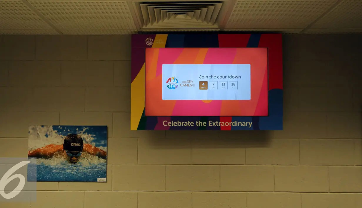 Papan hitung mundur perhelatan Sea Games 2015 Singapura terpampang di Main Press Centre (MPC) yang terletak di Gate 18 National Stadium Singapura, Senin (1/6/2015). (Liputan6.com/Helmi Fithriansyah)