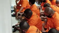 Polda Metro Jaya menetapkan 24 orang tersangka kasus dugaan judi online yang turut melibatkan sejumlah pegawai Kementerian Komdigi. (Liputan6.com/Ady Anugrahadi)