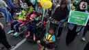 Sejumlah anak penyandang Cerebral Palsy mengikuti kampanye untuk memperingati Hari Cerebral Palsy Sedunia di kawasan Car Free Day, Jakarta, Minggu (13/10/2019). Kegiatan tersebut dilakukan untuk memperingati Hari Cerebral Palsy Sedunia yang jatuh pada tanggal 6 Oktober. (Liputan6.com/Johan Tallo)