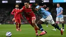 Bertandang ke markas Manchester City, Liverpool berhasil mengemas tiga poin berharga lewat kemenangan 2-0. (Paul ELLIS/AFP)