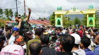 Demonstrasi menolak Natuna digunakan sebagai tempat karantina WNI yang pulang dari Wuhan, China. (Foto: Liputan6.com/Ajang Nurdin)