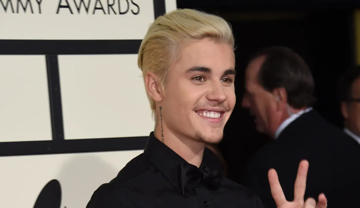 Sebagai seorang selebriti Hollywood yang memiliki jadwal pekerjaan yang segudang, tentu saja membuat Justin Bieber merasa bosan dan penat. Pelantun lagu 'Love Yourself' ini tengah berlibur ke Hawaii bersama teman-temannya. (AFP/Bitang.com)