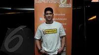 Pemeran Rama dalam film The Raid 2: Berandal, Iko Uwais mengaku tak bisa banyak berkata setelah melihat antusias penonton film terbarunya, The Raid 2: Berandal (Liputan6.com/Johan Tallo)