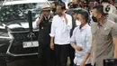 Presiden Joko Widodo bersama Gubernur Jawa Barat, Ridwan Kamil dan KSAD Dudung Abdurachman meninjau proses pencarian korban gempa Cianjur di kawasan Cugenang, Kab Cianjur, Selasa (22/11/2022). Setibanya di lokasi, Jokowi akan meninjau langsung dampak bencana gempa bumi berkekuatan magnitudo 5,6. (Liputan6.com/Helmi Fithriansyah)