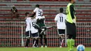Para Pemain T-Team Malaysia merayakan gol  saat melawan ATM FA pada babak Play Off Malaysia Super League. (Bola.com/Nicklas Hanoatubun)