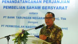 Dirut PT BTN, Maryono memberi sambutan saat acara penandatanganan perjanjian pembelian saham bersyarat PNMIM dari PNM di Kementerian BUMN, Jakarta, Senin (22/4). Melalui penandatangan tersebut, Bank BTN membeli 33.000 lembar saham PNMIM senilai Rp114,3 miliar milik PNM. (Liputan6.com/Angga Yuniar)