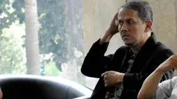 Anggito Abimanyu diperiksa sebagai saksi kasus dugaan korupsi penyelenggaraan ibadah haji di Kemenag dengan tersangka Suryadharma Ali, Jakarta, (7/9/14). (Liputan6.com/Miftahul Hayat)