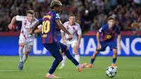 Pemain Barcelona Lamine Yamal ketika mencetak gol ke gawang Olympiacos di ajang Liga Champions. (MANAURE QUINTERO / AFP)