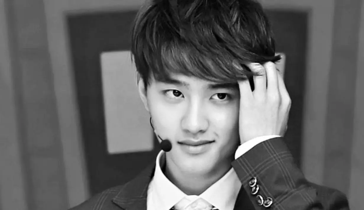 D.O termasuk sosok yang perhatian. Karena Kai senang nyemil, D.O kerap membawakan cemilan untuk Kai. (Foto: Allkpop.com)