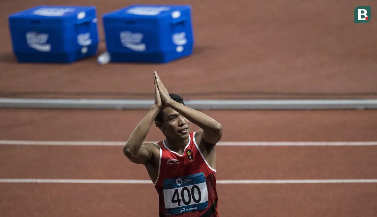 Pelari Indonesia, Lalu Muhammad Zohri, meminta maaf gagal meraih medali pada nomor 100 meter Asian Games di SUGBK, Jakarta, Minggu (26/8/2018). Lalu Zohri finish di urutan ke tujuh dengan catatan waktu 10,20 detik. (Bola.com/Vitalis Yogi Trisna)