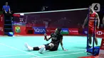 Reaksi tunggal putra Indonesia Jonatan Christie saat melawan wakil China Lu Guang Zu pada babak 32 besar Indonesia Masters 2024 di Istora Senayan, Jakarta, Indonesia, Rabu (24/1/2024). Jonatan kalah 21-19, 19-21, 19-21. (Bola.com/M. Iqbal Ichsan)