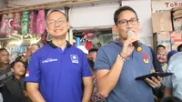 Sandiaga dan Eddy Soeparno di Pasar Anyar. ©2018 Merdeka.com