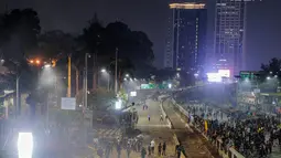 Suasana Jalan Tol Dalam Kota dan Jalan Gatot Soebroto pasca demonstrasi mahasiswa di depan Gedung DPR/MPR, Jakarta, Selasa (24/9/2019). Polda Metro Jaya (PMJ) sudah menyiapkan rekayasa lalu lintas saat demonstrasi saat menolak pengesahan RUU KUHP. (Liputan6.com/Faisal Fanani)