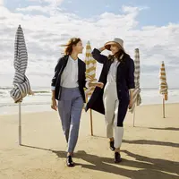 Menilik tren outfit liburan dengan gaya anggun dari Uniqlo x Ines de la Fressange (Foto: Uniqlo)