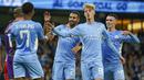 Pada menit ke-83 Riyad Mahrez mencetak gol keduanya untuk membawa Manchester City unggul jauh 5-1. Ia berhasil menyontek bola ke dalam gawang David Stockdale usai menerima umpan Raheem Sterling. (AP/Dave Thompson)