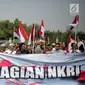 Massa Aliansi Masyarakat Indonesia Timur menggelar unjuk rasa di depan Istana Merdeka, Jakarta, Senin (2/9/2019). Massa menyatakan bahwa Papua tetap NKRI dan meminta pemerintah mengusut tuntas kasus rasis yang berujung konflik. (Liputan6.com/Faizal Fanani)