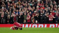 Mohamed Salah dari Liverpool merayakan setelah mencetak gol keempat timnya selama pertandingan leg kedua babak 16 besar Liga Champions antara Liverpool dan Galatasaray, di Liverpool, Inggris, Kamis (19-3-2026) dini hari WIB. (AP Photo/Jon Super)