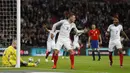 Striker Inggris, Jamie Vardy, melakukan selebrasi unik setelah mencetak gol kedua ke gawang Spanyol dalam laga persahabatan di Stadion Wembley, Selasa (15/11/2016). (Reuters/Darren Staples)